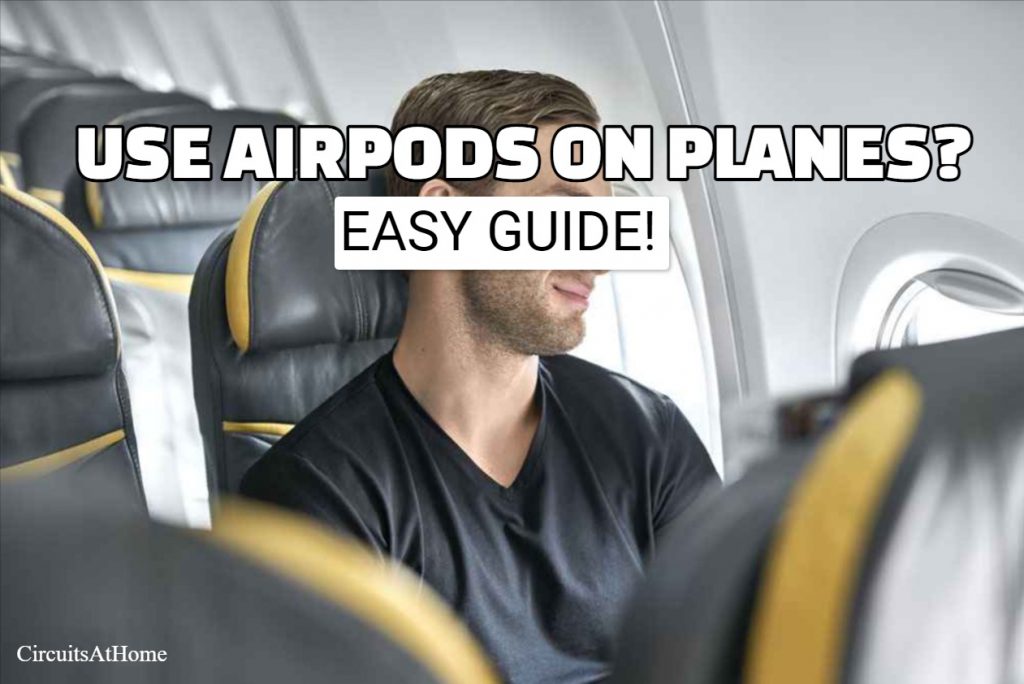guy on plane with noise cancelling earbuds jpeg 1200×675